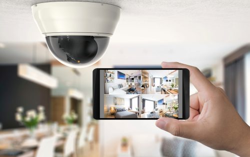 hand holding 3d rendering mobile connect with security camera