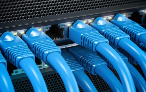 Network LAN internet cables connected in network switches. Server in data center. 3d illustration